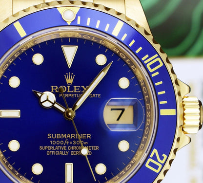 Rolex Submariner Date 16618 Blue Dial 18K Yellow Gold 40mm