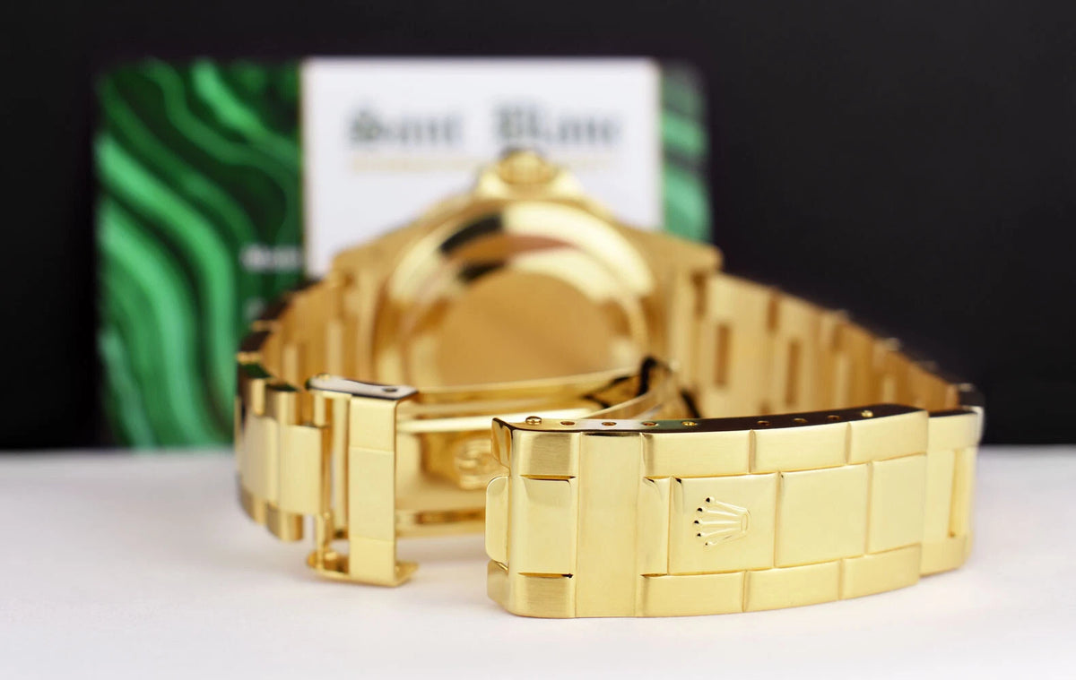 Rolex Submariner Date 16618 Blue Dial 18K Yellow Gold 40mm